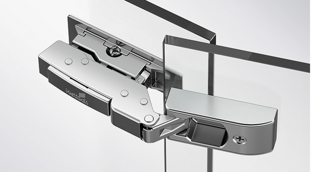 Dobradiça Sensys para portas de Vidro Hettich oferece total sofisticação para seus projetos. Sem necessidade de furação pode ser utilizada